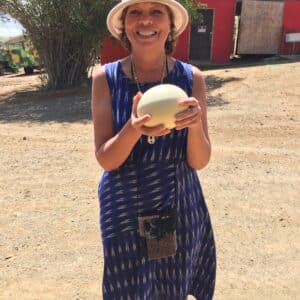 Desnise holidng an ostrich egg